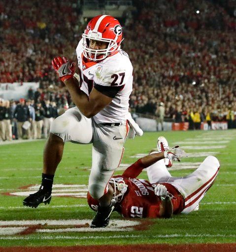 'Dawgs run wild: Georgia beats Oklahoma 54-48 in Rose Bowl