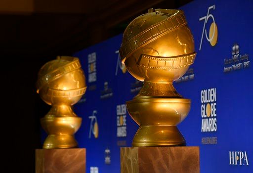 Oprah, 'Three Billboards' triumph at black-draped Globes