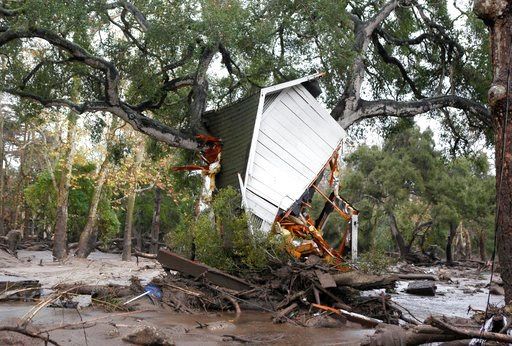 Victim search expands as California storm, mudslides kill 13