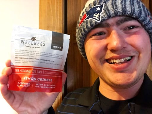 (Zac Mercauto via AP). This Jan. 10, 2018, photo provided by Zac Mercauto shows him holding a package of marijuana cookies in Fryeburg, Maine. Mercauto is one of many proponents of legalized marijuana who supports President Donald Trump, but thinks his...
