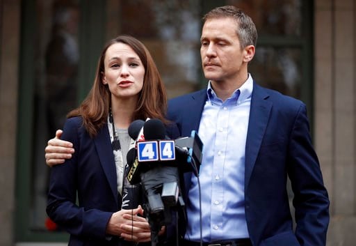 (AP Photo/Jeff Roberson, File). FILE - In this Dec. 6, 2016, file photo, Missouri Gov.-elect Eric Greitens and his wife Sheena speak to the media in St. Louis after she had been robbed at gunpoint the day before. Missouri Gov. Eric Greitens appears to ...