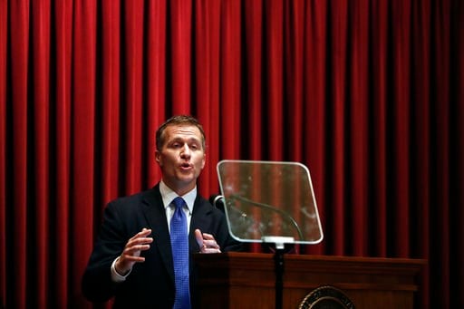 (AP Photo/Jeff Roberson, File). FILE - In this Wednesday, Jan. 10, 2018 file photo, Missouri Gov. Eric Greitens delivers the annual State of the State address to a joint session of the House and Senate, in Jefferson City, Mo. Greitens appears to be bra...