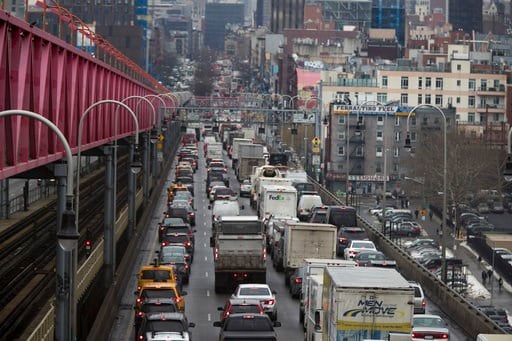 (AP Photo/Mary Altaffer). In this Thursday, Jan. 11, 2018 photo, traffic crosses the Williamsburg bridge in New York from Brooklyn into Manhattan. A proposal to make part of Manhattan a toll zone, where drivers would be charged to drive into the most c...
