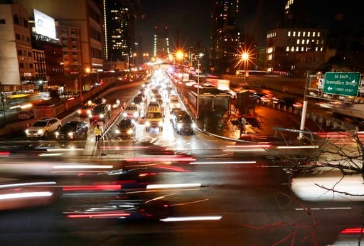 (AP Photo/Frank Franklin II). In this Jan. 11, 2018 photo, cars pass the Queensboro Bridge in New York. "Congestion pricing," a proposal to thin New York City's bad traffic by making part of Manhattan a toll zone is gaining momentum after years of poli...