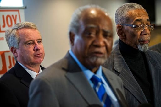 (Zbigniew Bzdak/Chicago Tribune via AP). In this Jan. 3, 2018 photo, Democratic Illinois gubernatorial candidate Chris Kennedy, left,  gathers with community leaders to discuss gun violence in Chicago at a press conference accompanied by, U.S. Rep. Dan...