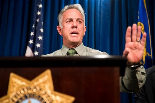 (Erik Verduzco/Las Vegas Review-Journal via AP, file). FILE - In this Oct. 9, 2017 file photo, Clark County Sheriff Joe Lombardo discusses the Route 91 Harvest festival mass shooting at the Las Vegas Metropolitan Police Department headquarters in Las V...