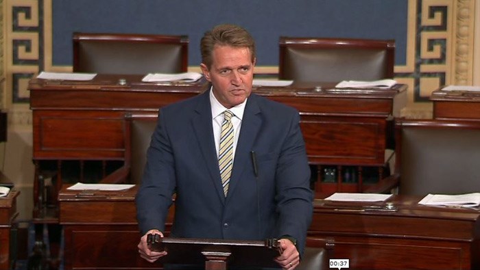 Sen. Jeff Flake, R-AZ, denounced President Donald Trump's use of the terms "fake news" and "enemy of the people" to describe the news media and stories he doesn't like. (Senate TV/CNN)