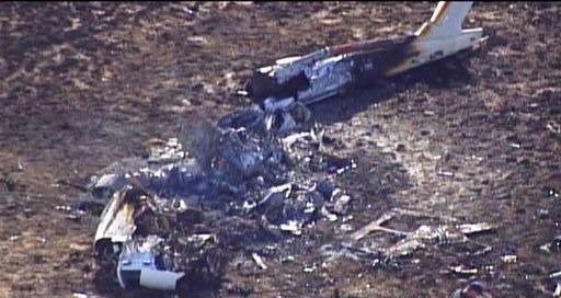 'Watching my family burn': Woman frantic after copter crash