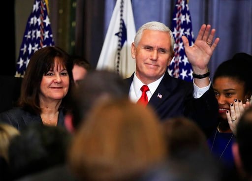 (AP Photo/Manuel Balce Ceneta). Vice President Mike Pence with his wife Karen Pence, left, waves to anti-abortion supporters and participants of the annual March for Life event, during a reception in the Indian Treaty Room at the Eisenhower Executive O...