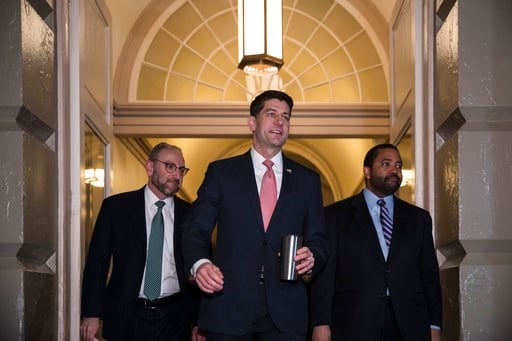 (AP Photo/J. Scott Applewhite). Speaker of the House Paul Ryan, R-Wis., arrives for a meeting of fellow Republicans on the first morning of a government shutdown after a divided Senate rejected a funding measure, at the Capitol in Washington, Saturday,...