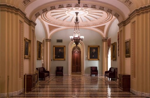 (AP Photo/J. Scott Applewhite). The corridors surrounding the Senate are empty on the first day of a government shutdown after a divided Senate rejected a funding measure, at the Capitol in Washington, Saturday, Jan. 20, 2018.