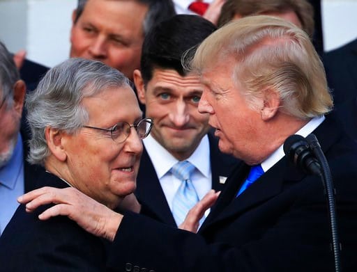 (AP Photo/Manuel Balce Ceneta, File). President Donald Trump congratulates Senate Majority Leader Mitch McConnell of Ky., while House Speaker Paul Ryan of Wis., watches to acknowledge the final passage of tax overhaul legislation by Congress at the Whi...