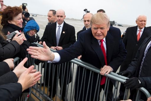 (AP Photo/Evan Vucci, File). President Donald Trump shakes hands with supporters after arriving at Salt Lake City International Airport, Monday, Dec. 4, 2017, in Salt Lake City.