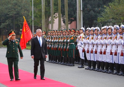 (AP Photo/Tran Van Minh). U.S. Defense Secretary Jim Mattis, right and his Vietnamese counterpart Ngo Xuan Lich, left, review an honor guard before heading for talks in Hanoi, Vietnam, Thursday, Jan. 25, 2018. Mattis is on a two-day visit to Vietnam to...