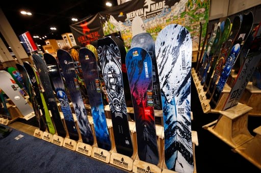 (AP Photo/David Zalubowski). Snowboards are on display at the Mervin Made booth at the opening of the Outdoor Retailers and Snow Show in the Colorado Convention Center, Thursday, Jan. 25, 2018, in Denver. Three floors of all the latest products for out...