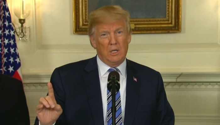 Trump signs $1.3 trillion budget after threatening veto