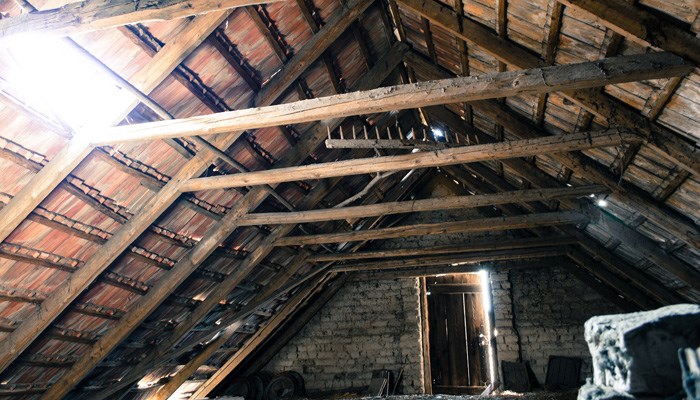 Kansas woman's ex hides in attic, falls through ceiling