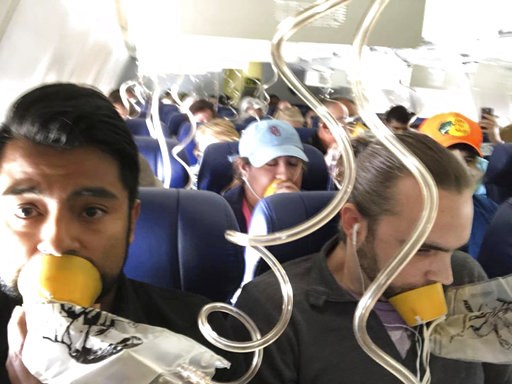 A boom, a whoosh of air and then terror on Flight 1380