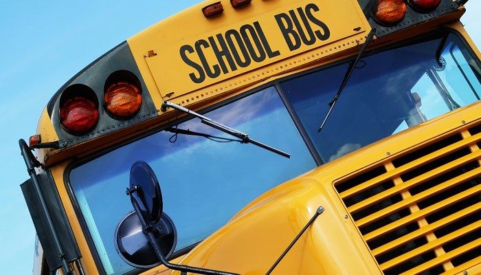 Multiple people hurt after school bus, dump truck crash