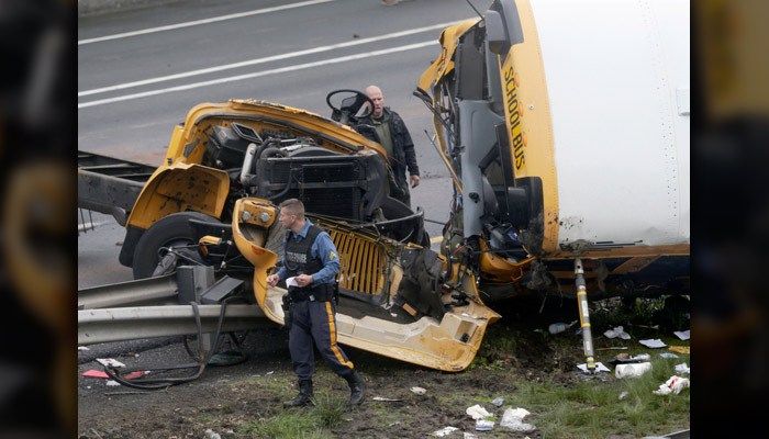 School bus ripped apart in dump truck crash, killing 2