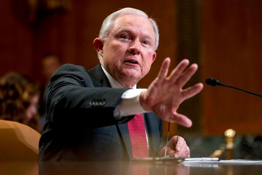 Justice Department takes aim at heart of health law