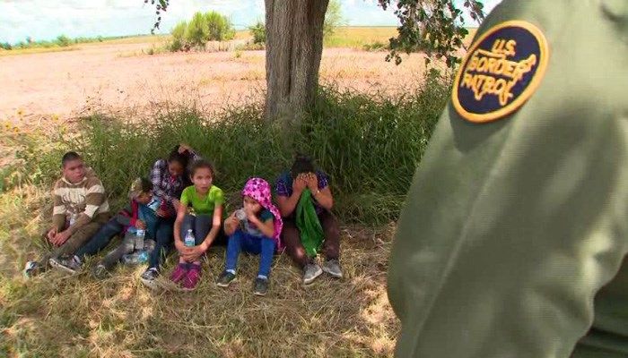 Hundreds of children wait in Border Patrol facility in Texas