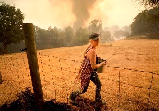 Battling 18 blazes, California may face worst fire season