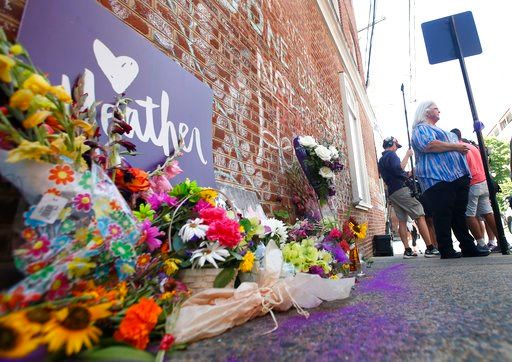 Tense confrontation amid peaceful vigils in Charlottesville