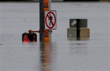 (AP Photo/Eric Gay). A flood gage shows waters just under 10 feet at an intersection, Saturday, May 25, 2013, in San Antonio. (AP Photo/Eric Gay). A flood gage shows waters just under 10 feet at an intersection, Saturday, May 25, 2013, in San Antonio.