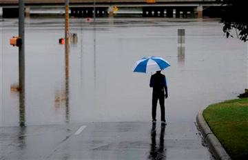 (AP Photo/Eric Gay). A man surveys floodwaters caused by heavy rains, Saturday, May 25, 2013, in San Antonio. (AP Photo/Eric Gay). A man surveys floodwaters caused by heavy rains, Saturday, May 25, 2013, in San Antonio.