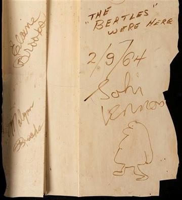 (AP Photo/Heritage Auctions). This undated photo provided by Heritage Auctions shows autographs by The Beatles on a 4-foot-by-2-foot section of a backdrop wall  from the New York theater where The Ed Sullivan Show theater took place.