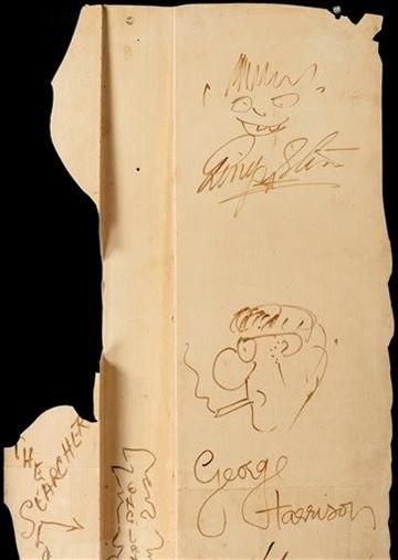 (AP Photo/Heritage Auctions). This undated photo provided by Heritage Auctions shows autographs by The Beatles on a 4-foot-by-2-foot section of a backdrop wall  from the New York theater where The Ed Sullivan Show theater took place.