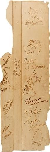 (AP Photo/Heritage Auctions). This undated photo provided by Heritage Auctions shows autographs by The Beatles on a 4-foot-by-2-foot section of a backdrop wall  from the New York theater where The Ed Sullivan Show theater took place.