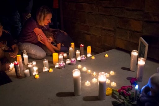 The Latest: Police investigating Colorado man found affair